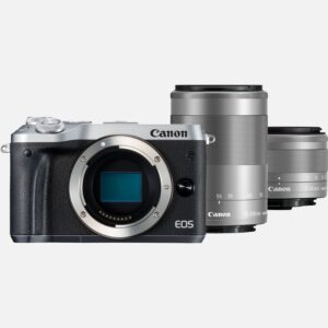 Kleines Gehuse groe Leistung. Die EOS M6 bietet zusammen mit den Objektiven EF-M 15-45mm f/3.5-6.3 IS STM und EF-M 55-200mm f/4.5-6.3 IS STM Geschwindigkeit, Qualitt und Leistung einer DSLR in einem Paket, das sich ideal fr unterwegs eignet. Die diskrete Form und der flexible Zoombereich machen diese Kombination ideal fr die alltgliche Action der Street-Fotografie damit hltst du die flchtigen Momente fest, die anderen verborgen bleiben. Vorteile berzeugend detailreiche Aufnahmen mit 24,2 Megapixeln Gestochen scharfe Ergebnisse dank eines AF-Systems, das so schnell ist wie bei einer DSLR Natrlich wirkender, gleichmiger AF und kamerainterne 5-achsige Bildstabilisierung fr professionell wirkende Videoaufnahmen Erkunde unsere Serie an ultra-kompakten EF M Objektiven ideal fr Reisen Erkunde verschiedene Perspektiven mit dem vielseitigen Zoomobjektiv EF-M 15-45mm f/3.5-6.3 IS STM Mit dem leistungsstarken EF-M 55-200mm f/4.5-6.3 IS STM Objektiv kannst du entfernte Motive nah heranholen Dual Pixel CMOS AF fhrt die Schrfe auf sich bewegende Motive nach Kabellose Steuerung und Datenbertragung ganz einfach dank WLAN mit NFC und Bluetooth Mehr als 80 EF und EF-S Objektive lassen sich mit dem optional erhltlichen Objektivadapter EF-EOS M ebenfalls und ohne Einbuen bei der Qualitt oder der Fokussiergeschwindigkeit benutzen. Kompatibel mit der kostenlosen Canon Photo Companion App. Personalisierte Inhalte, Challenges und Inspirationen, die dich auf deiner fotografischen Reise weiter bringen der ideale Partner fr den Erzhler visueller Geschichten. Kompatibel mit der kostenlosen Canon Camera Connect App. Verbinde dein Apple oder Android Mobilgert mit deiner Kamera und du kannst deine Aufnahmen ganz einfach bertragen und teilen Lieferumfang EOS M6 Gehuse Silber Kamera-Gehusedeckel R-F-4 Akkuladegert LC-E17E Akku LP-E17 EF-M 15-45mm f/3.5-6.3 IS STM Objektiv Graphit-Grau EF-M 55-200mm f/4.5-6.3 IS STM Objektiv Graphit-Grau 2 x Objektivrckdeckel EB Objektivdeckel E-52 II Objektivdeckel E-49 Tragegurt EM-300DB Netzkabel Anleitungen Technische Daten 24,2MP CMOS-Sensor im APS-C-Format fr DSLR-Bildqualitt Full-HD mit 60 B/s Besonders ruhige und realistische Videos DIGIC 7 Prozessor Schnell und leistungsfhig 5-achsige digitale Bildstabilisierung Schtzt selbst mit Objektiven ohne IS vor Kamerawacklern Dual Pixel CMOS AF Schnell bei Fotos; gleichmig bei Videos WLAN / NFC Kabellos verbinden, teilen und Backups erstellen Aufnahmen mit 7 B/s Mit Servo AF Bluetooth Konstante Kopplung Alle technischen Daten zeigen