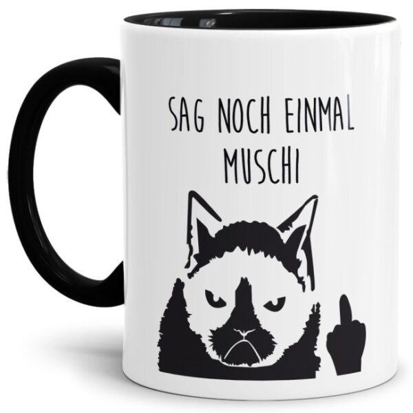 Lustige Katzen Tasse mit witzigem Spruch - Sag noch einmal Muschi. Dieser lustige Kaffeebecher mit schwarzem Akzent aus hochwertiger Keramik wird...