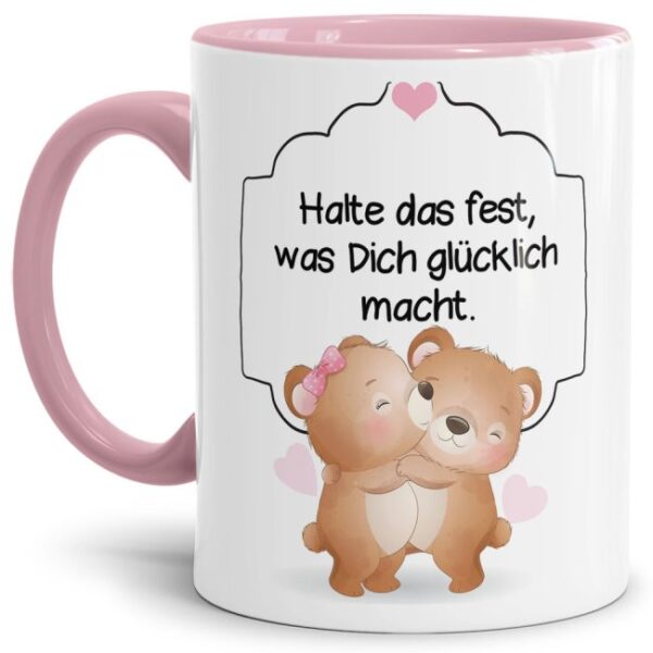 Liebevoll gestaltete Tasse mit Bärchen-Motiv mit rosa Akzent und süßem Spruch - was Dich glücklich macht. Die ideale Geschenk-Idee für Verliebte