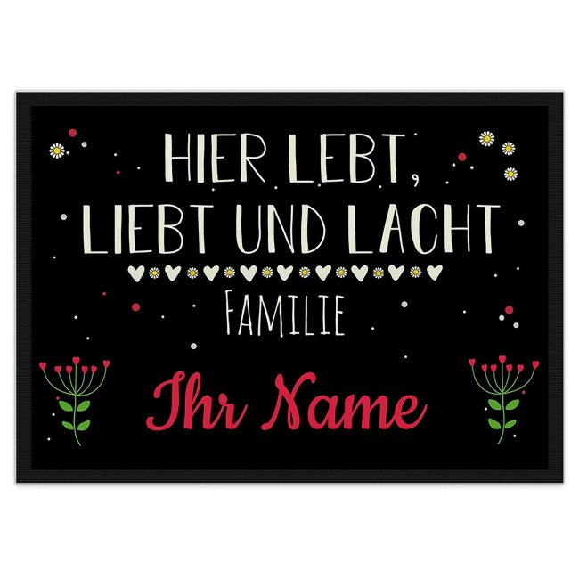 Trendig gestaltete Fußmatte in der Größe 75 x 50 cm mit hübschem Blumenmotiv und Spruch - Hier lebt