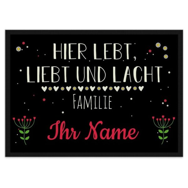 Trendig gestaltete Fußmatte in der Größe 90 x 60 cm mit hübschem Blumenmotiv und Spruch - Hier lebt