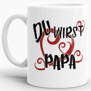 Tasse mit lustigem Spruch zum Verkünden der Schwangerschaft in freudiger Erwartung auf einen neuen