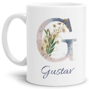 Liebevoll gestaltete Tasse mit Buchstabe und Name verziert mit einer Ranke aus Gräsern und Blumen. Der personalisierbare Kaffeebecher mit Monogramm...