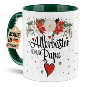 Liebevoll gestaltete Weihnachtstasse für Deinen Bonuspapa als hübsche Geschenkidee für die Adventszeit. Perfekt für Kaffee