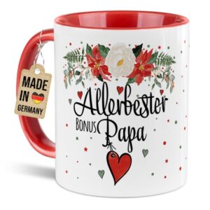 Liebevoll gestaltete Weihnachtstasse für Deinen Bonuspapa als hübsche Geschenkidee für die Adventszeit. Perfekt für Kaffee